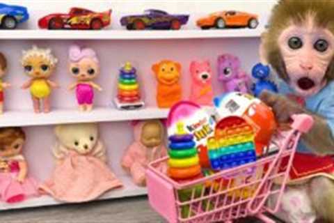 Monkey Baby Bon Bon doing shopping in Car Toy store and eat Kinder Joy Egg chocolate in the garden
